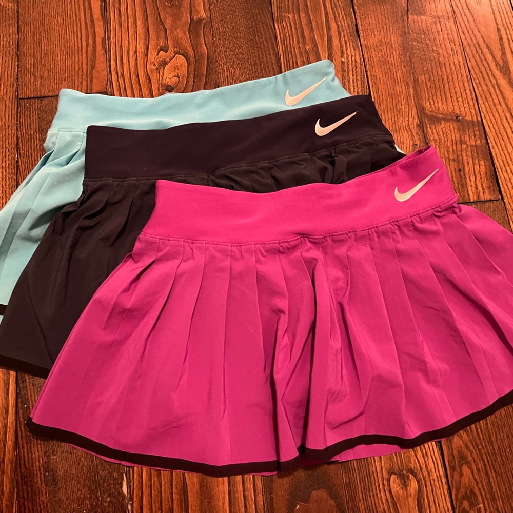 Nike Tennis Skirts in Pink, Black, and Blue